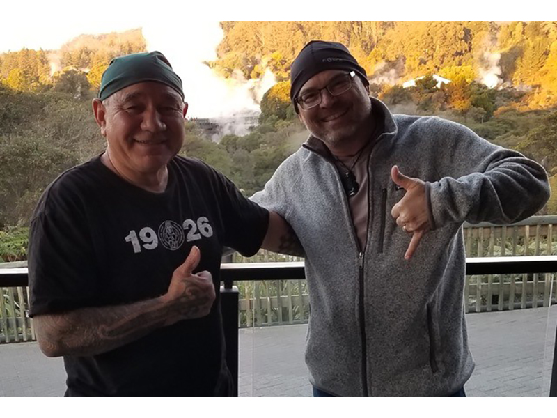 Serge Marek (right) with a Maori master carver in Rotorua in 2018